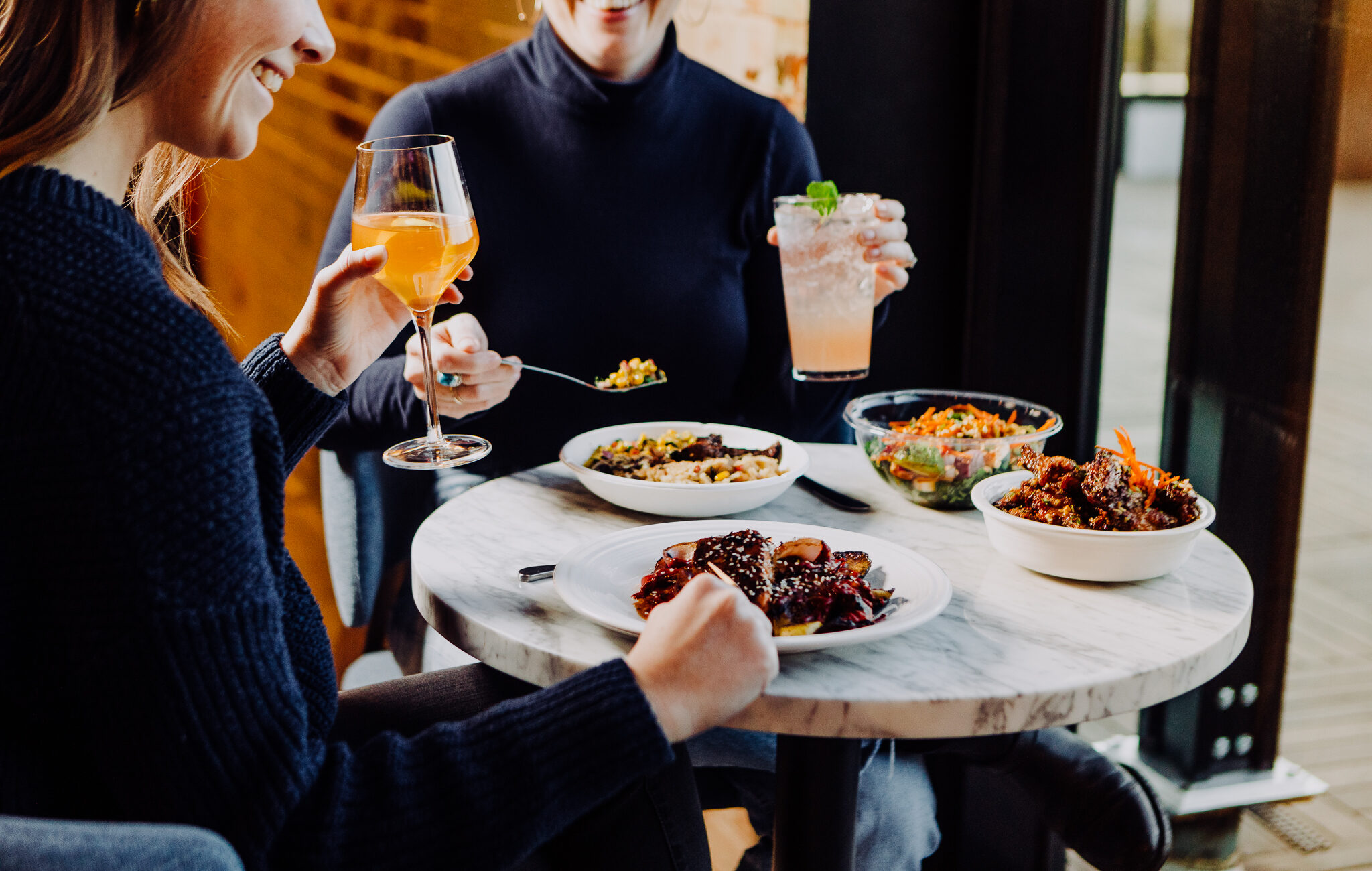 Woman eating at a table